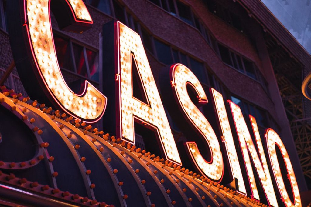 A vibrant casino exterior lit up at night