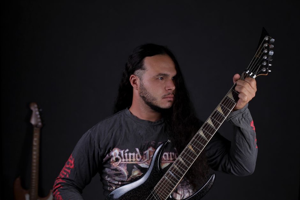 Guitarists performing intense thrash metal riffs
