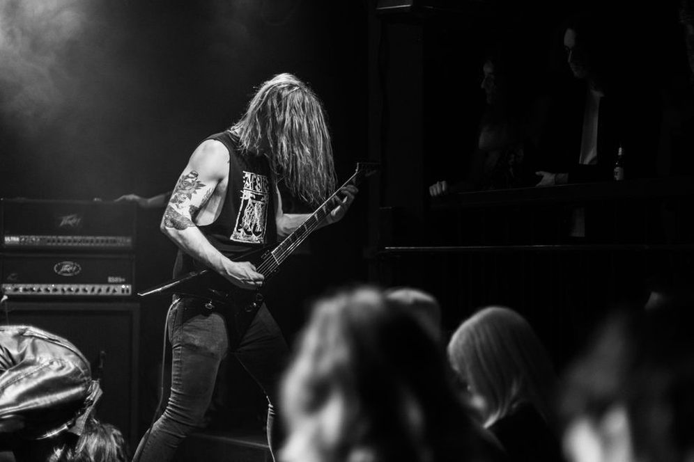 Finnish thrash metal band performing live on stage