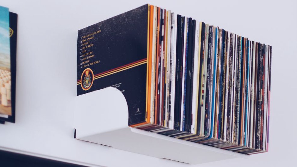 Collection of Finnish thrash metal albums on a shelf