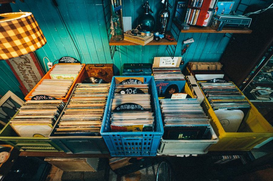 shelf of LP jackets with hand-drawn artwork and small-label logos