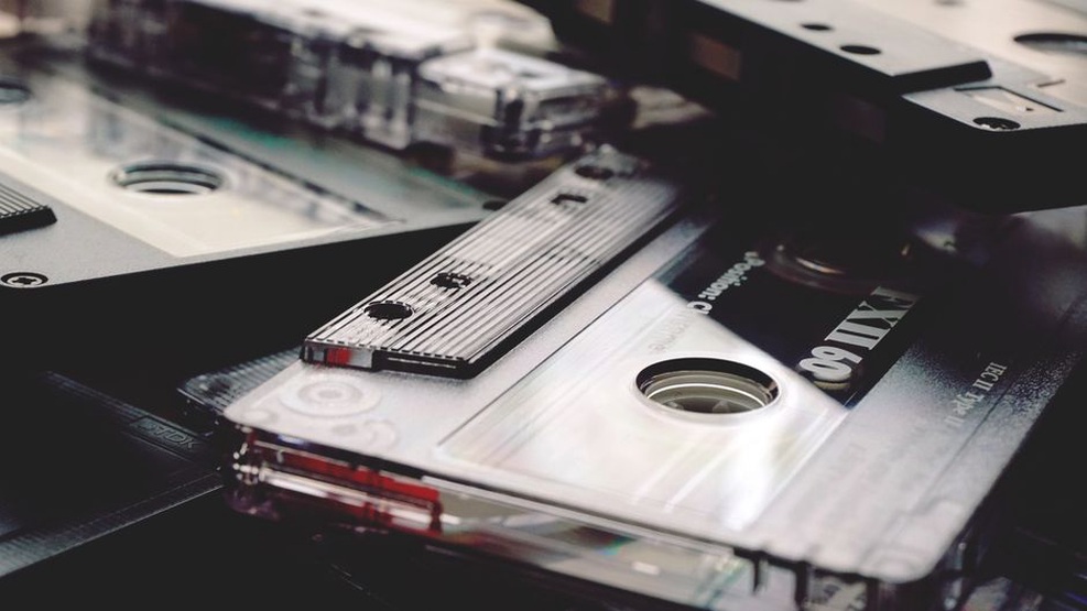 Physical releases and online updates meet at a merch table