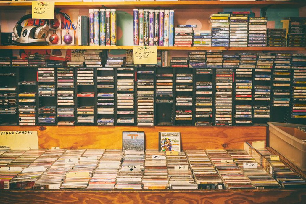 Cassettes and vinyl in a metal record collection