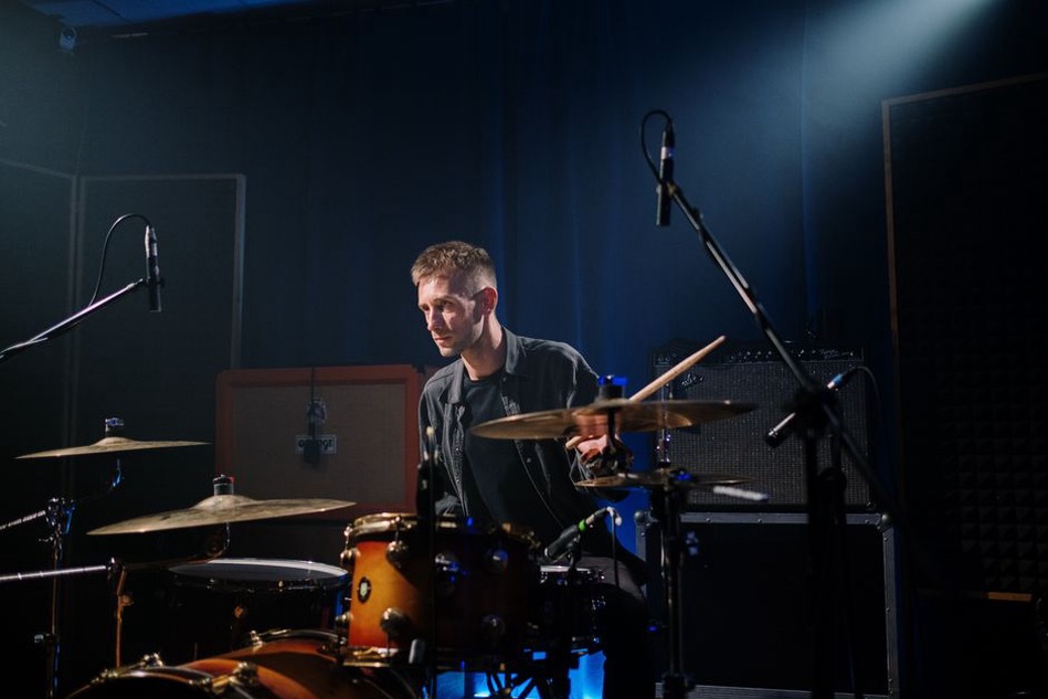 Drums and amplifiers set for a club performance