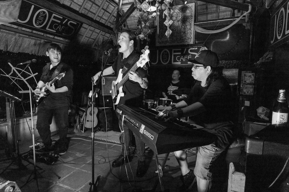 Guitarist and drummer share a tightly timed passage