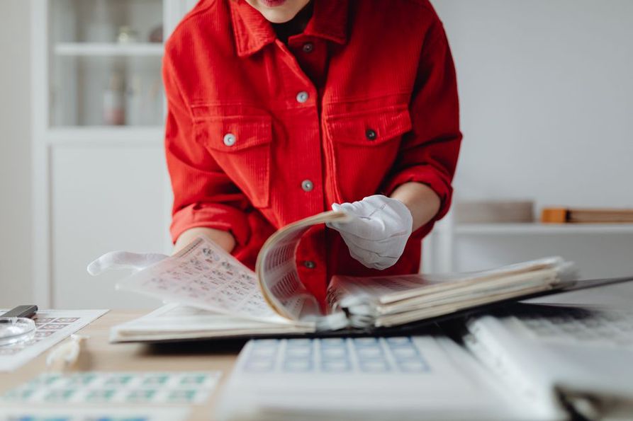 A listener checks edition details against a cassette sleeve