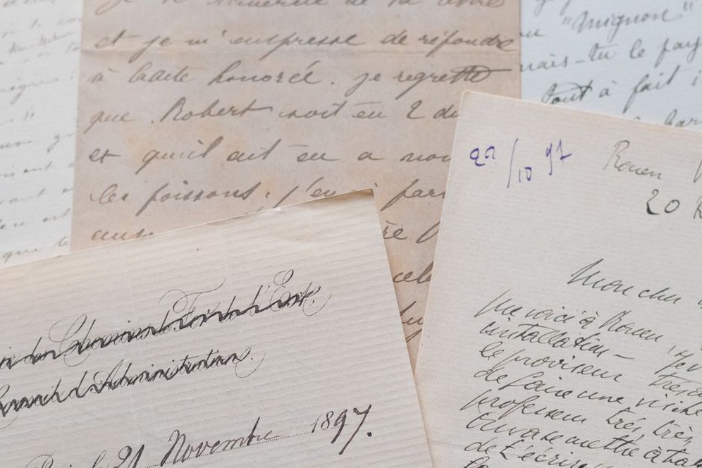 Handwritten date checks beside a preserved gig flyer