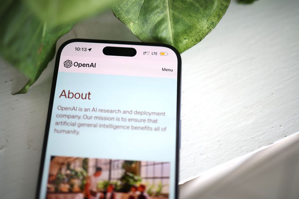 A thumb reaches the Releases menu item