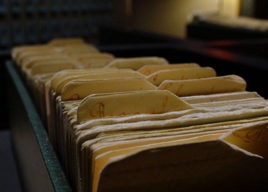 A record sits beside its catalogue notes