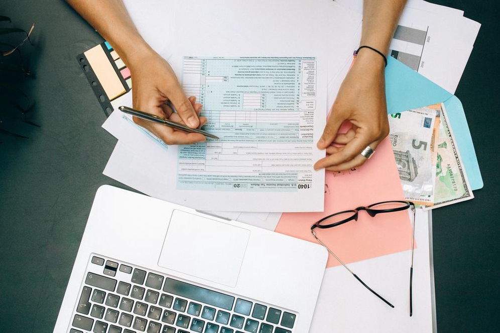 Archive volunteer checks payments against saved receipts